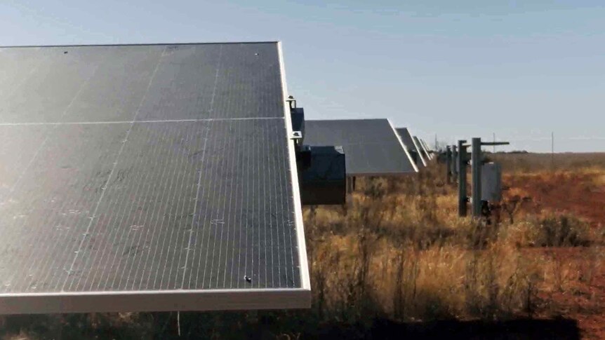 a close up of a solar panel on a rural property