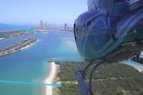 Chopper looking across the Gold Coast Broadwater with the city in the background