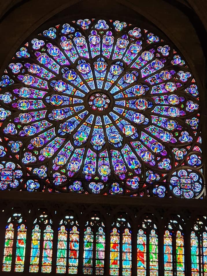 The famous stained glass window inside Notre Dame cathedral.