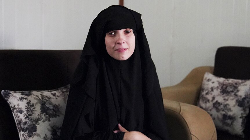 Nesrine Zahab with her veil lifted