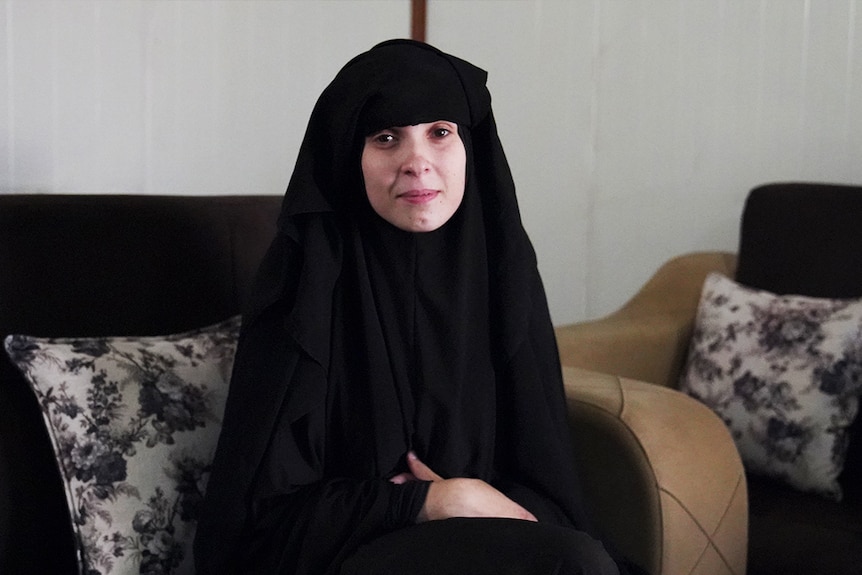 Nesrine Zahab with her veil lifted