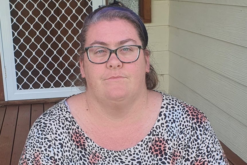 Shannon Hubble pictured in front of a house