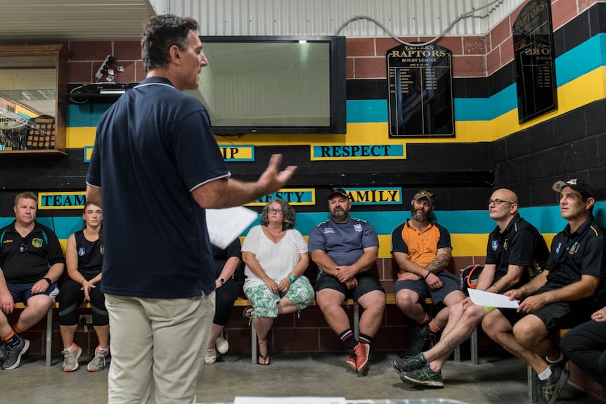 Paul Zappa (Centre) of NIRODAH Club Respect , speaking during an outreach session for Parents in the Eastern Raptors club.