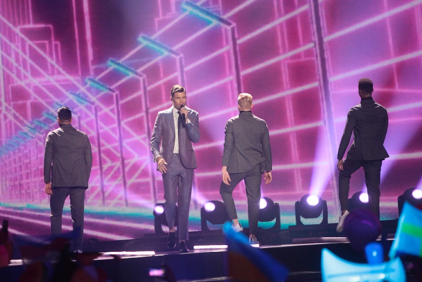 Robin Bengtsson from Sweden performed his song I Can't Go On with three backup dancers in suits