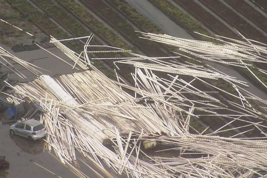 A large number of white sticks on the ground, seen from above