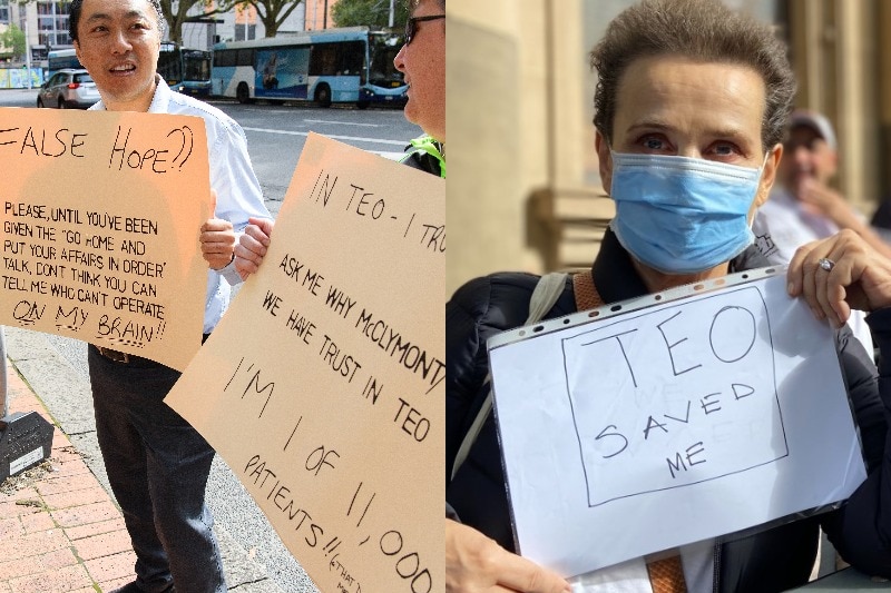 People holding signs 