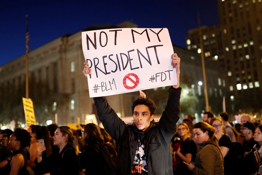 person protests at 2016 Trump rally