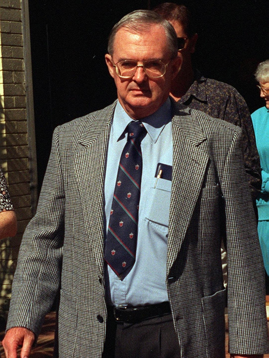 Father Vince Ryan standing outside.