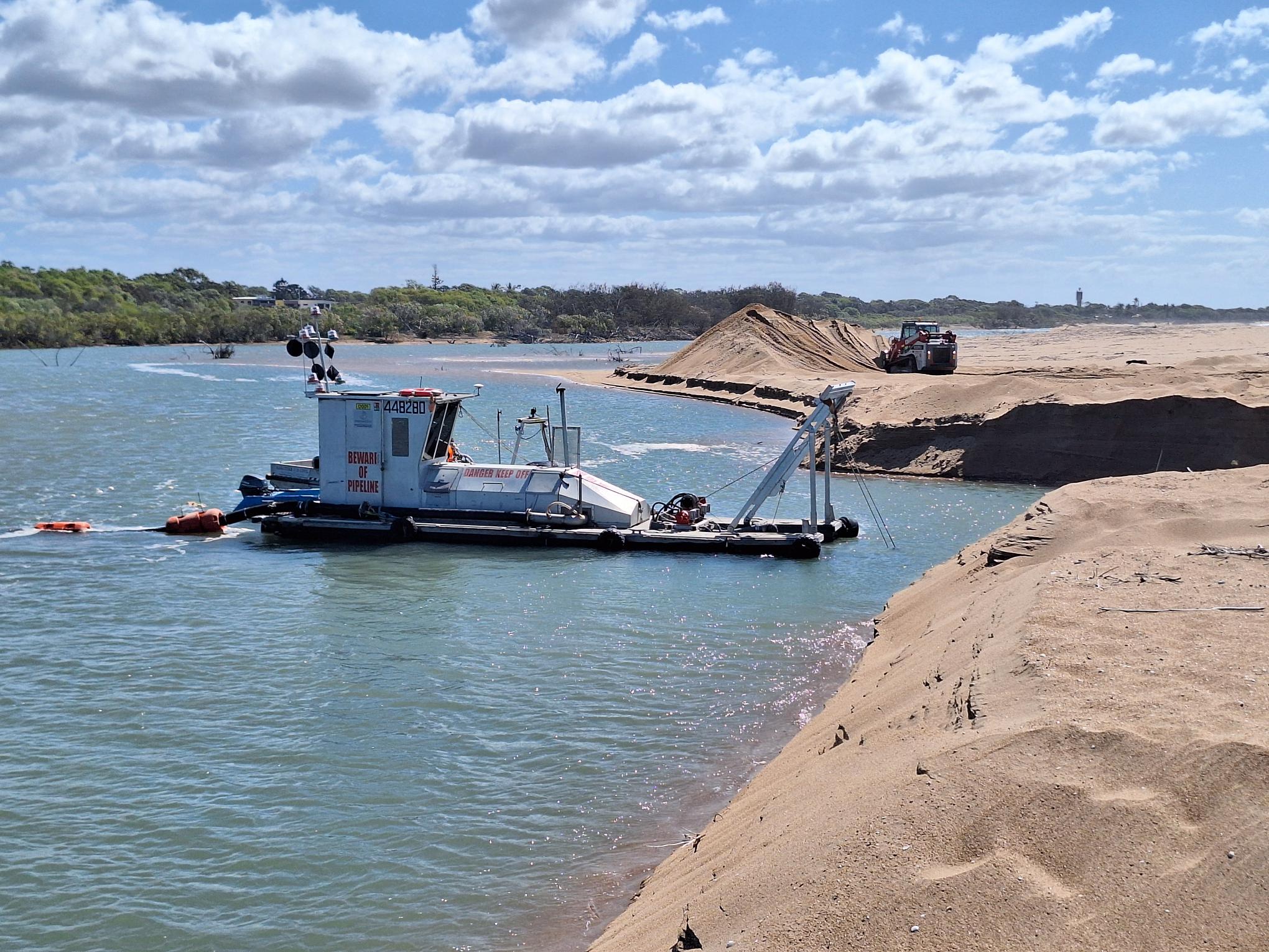 Urgent dredging underway to save disappearing Queensland beach