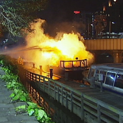 Docked tourist boat on fire on Yarra River