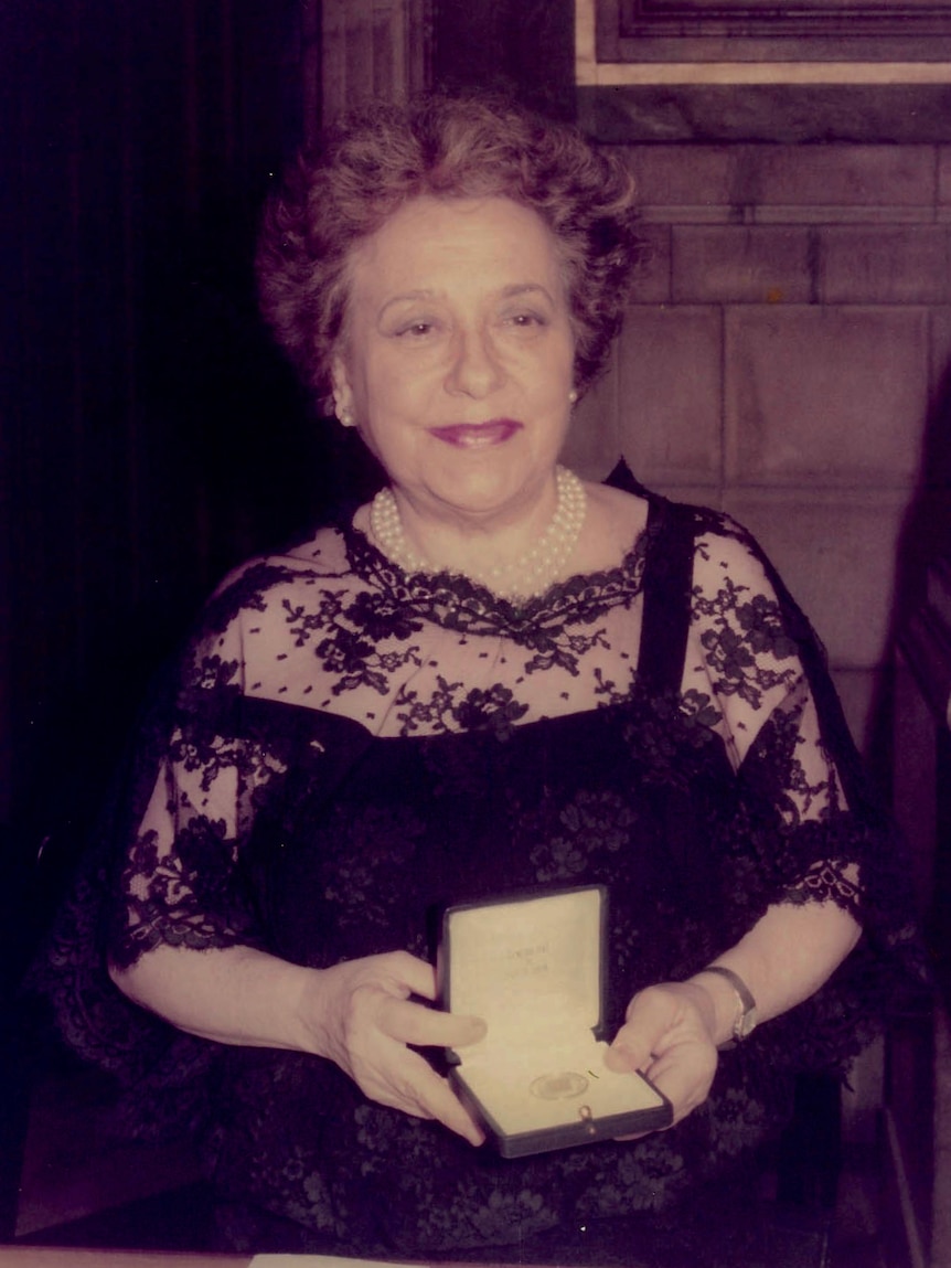 Spanish pianist Alicia de Larrocha holding a medal in 1983.