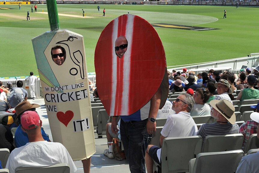 Mikey Southcott of Devon in the UK (bat) and Clayton Scott of Nelson, NZ (ball) dress up at the MCG.