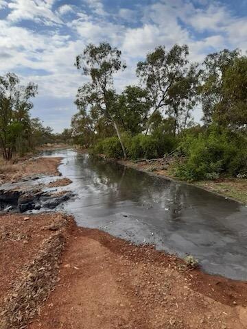 Dark liquid spill in outback Queensland