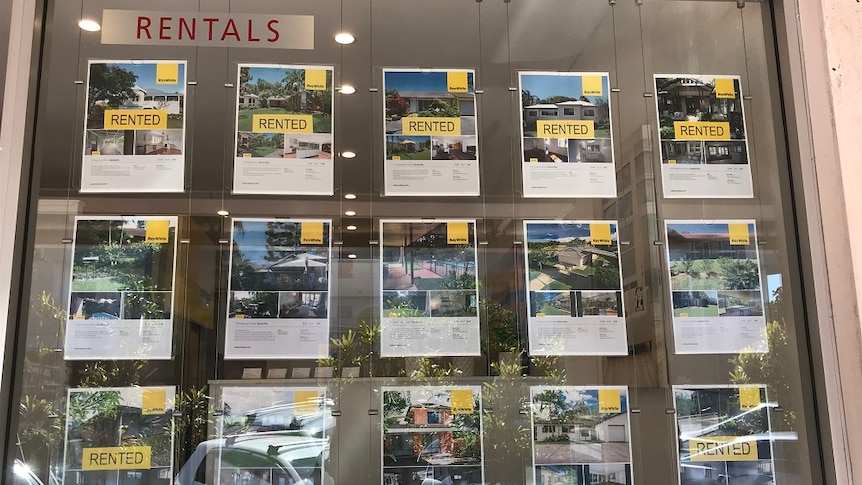 Images of rental properties in a window