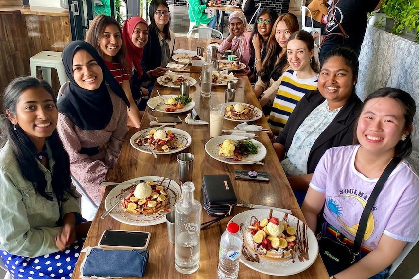 A group of people eating at Micasa in Brisbane's south east.