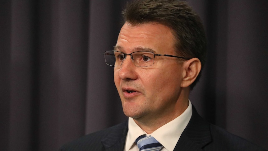 Reece Kershaw speaking at a press conference at Parliament House