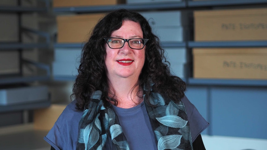 Space archaeologist Dr Alice Gorman wearing black-framed glasses