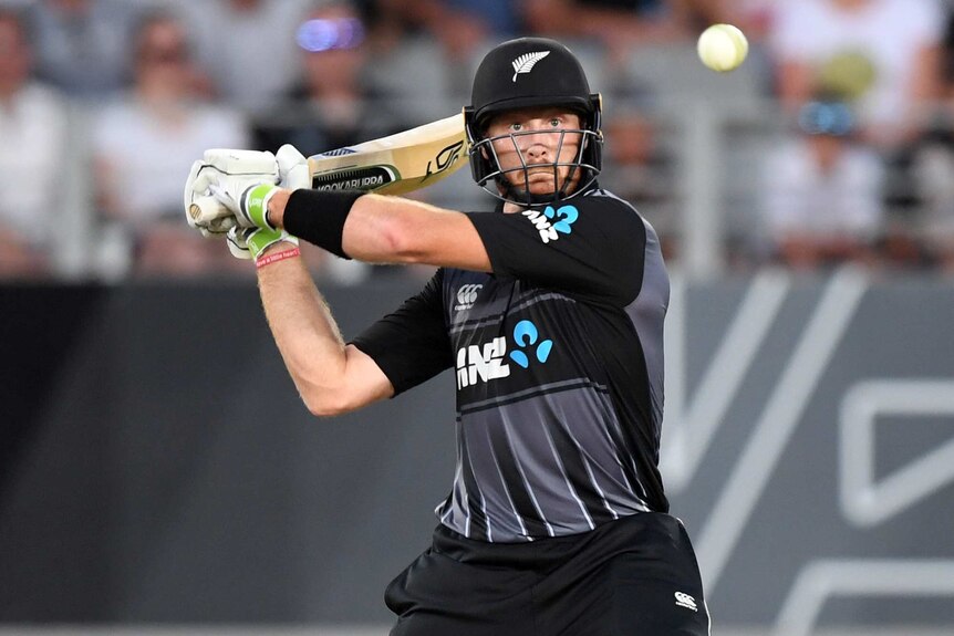Martin Guptil hits the ball playing for New Zealand against Australia in the Twenty20 international at Eden Park.