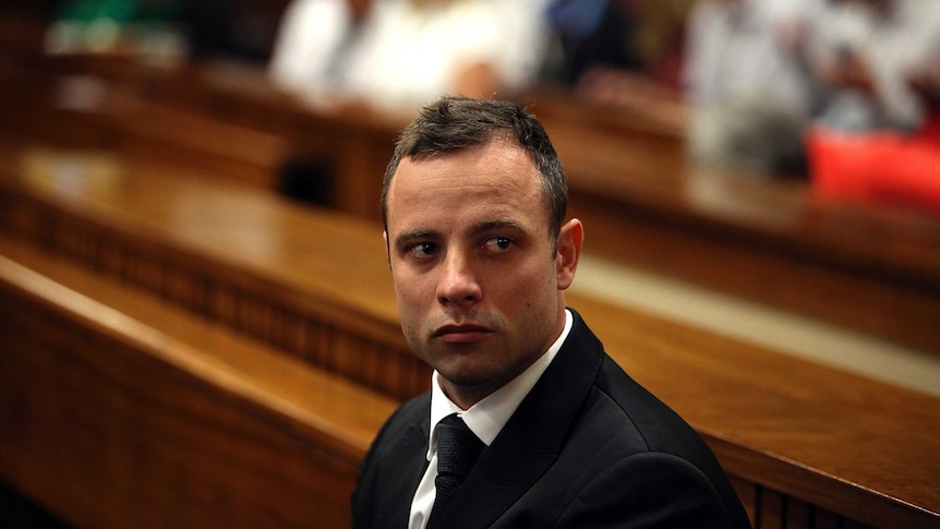 Oscar Pistorius sits in the dock at his trial