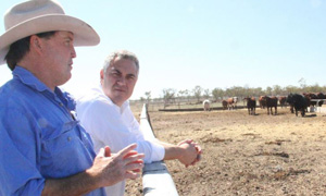 Federal Treasurer Joe Hockey and Walgett farmer Cam Rowntree