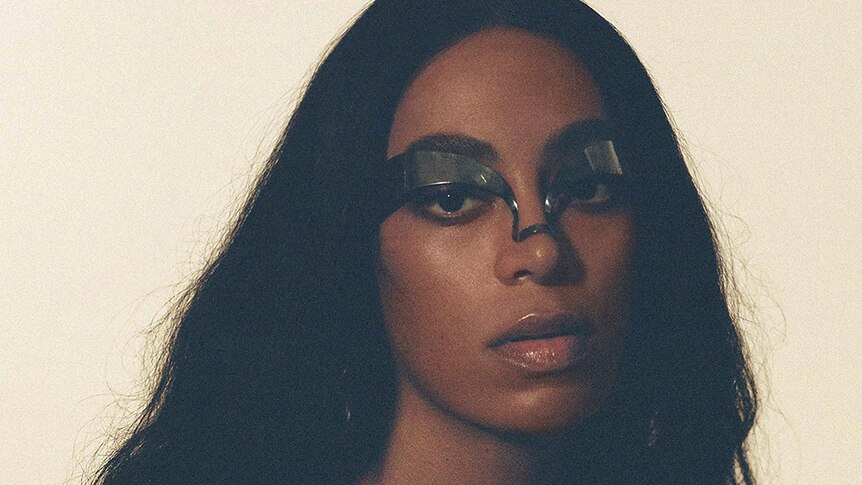 Photo of Solange wearing an eyepiece