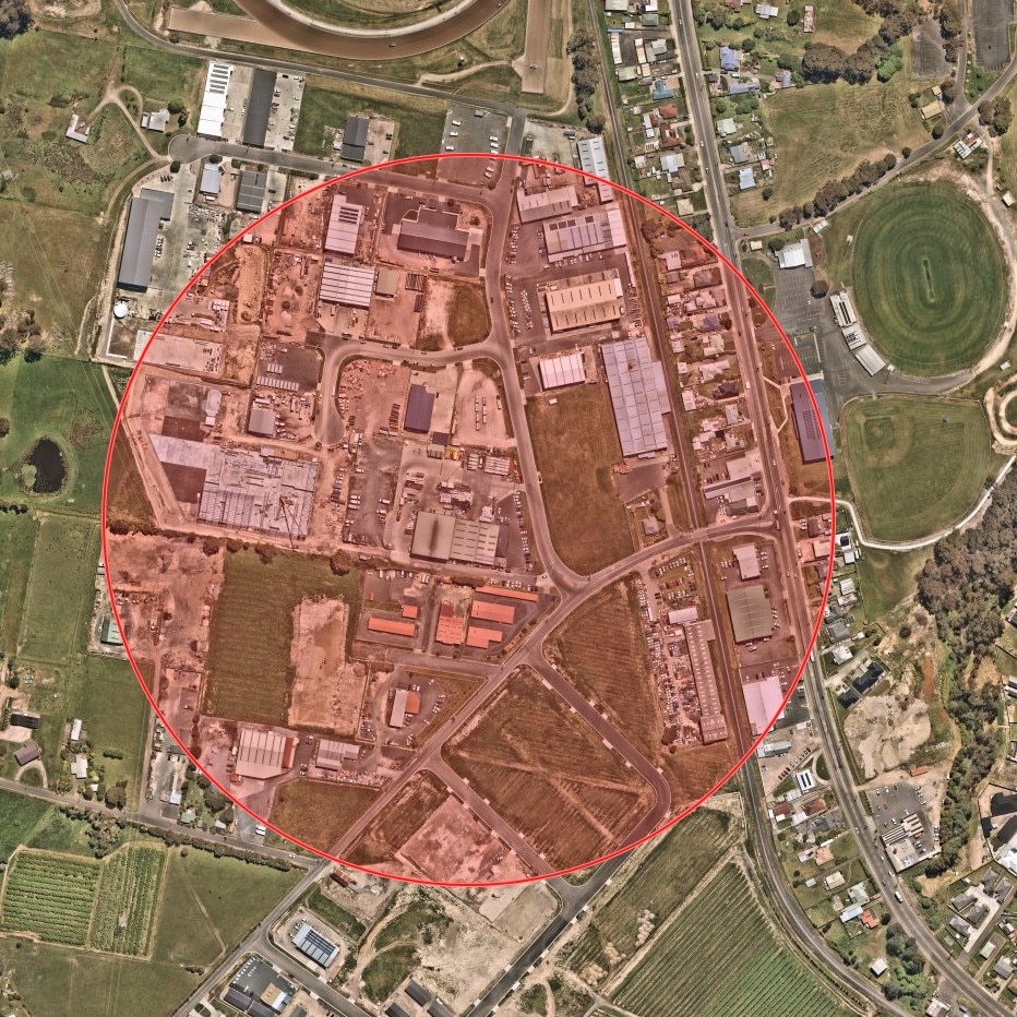 A map of Spreyton with a red circle showing 600 metres from a waste management plant.