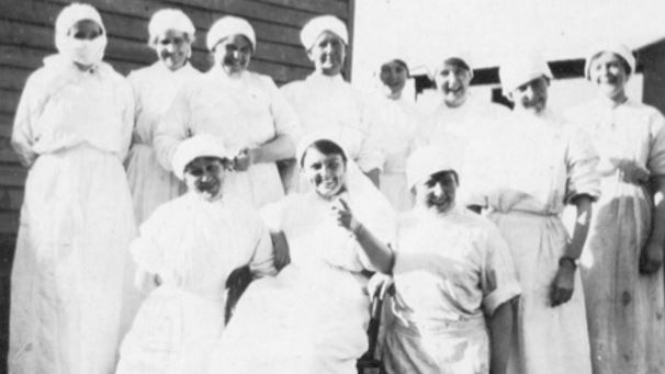 A group of women in nurses uniforms during the Spanish Flu pandemic.
