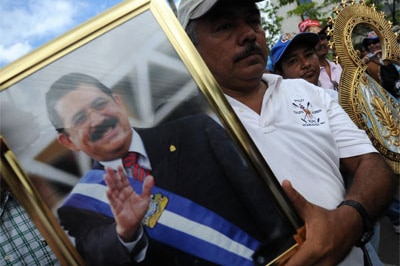 Supporters of ousted Honduran president Manuel Zelaya rally outside the US Embassy in Tegucigalpa