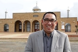 Religion leader, Alep Mydie stands proud in front of a mosque located in Katanning, Western Australia