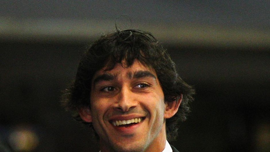 Free to play: Johnathan Thurston all smiles at the NRL judiciary in Sydney.