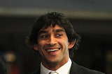Free to play: Johnathan Thurston all smiles at the NRL judiciary in Sydney.