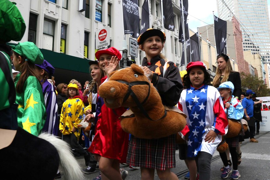 Children take part in the 2017 Melbourne Cup parade.