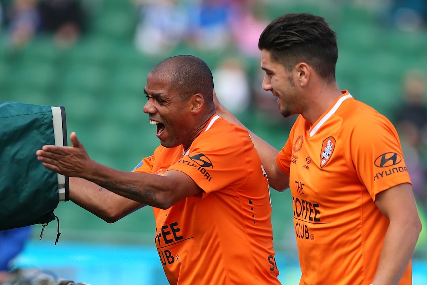 Brisbane's Henrique celebrates after scoring against Perth Glory at Perth Oval on October 19, 2014.