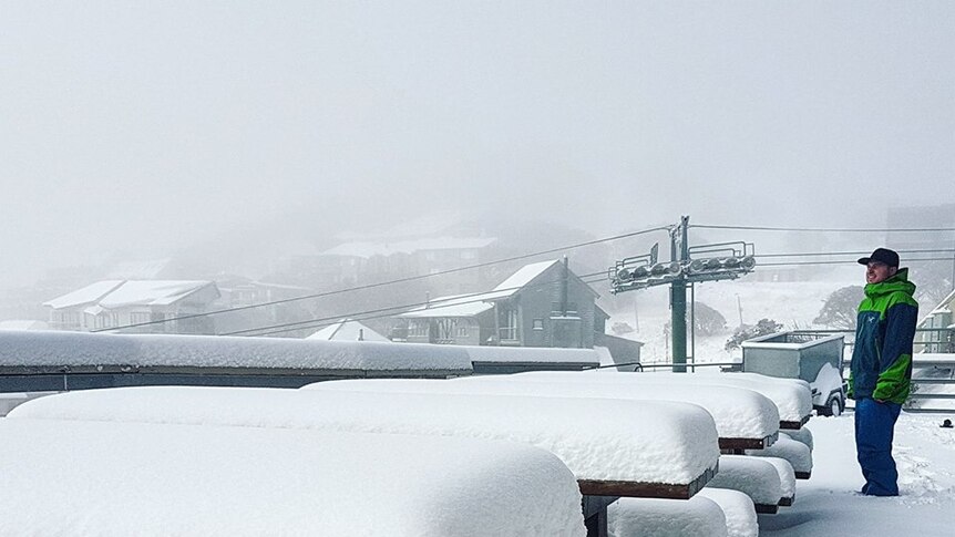 Snow accumulating on tables at Mt Hotham Ski Resort