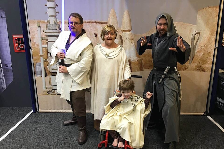 Star Wars fans in costume with a young fane at the Gold Coast Supanova Convention