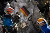 Gendarmes work at the crash site of the Germanwings Airbus