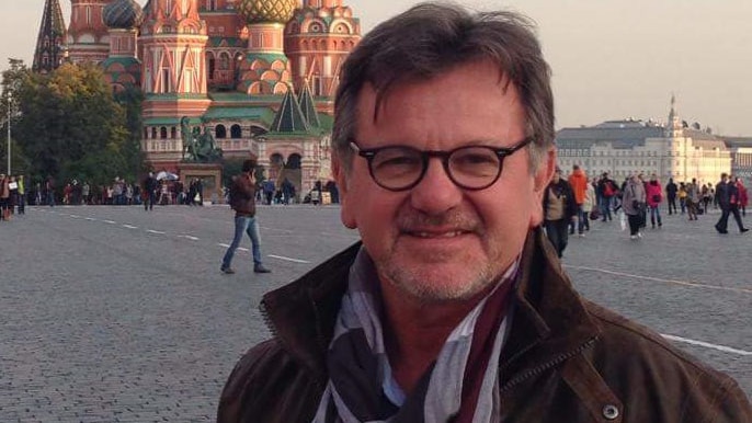 Vic Kostiuk standing outside the Kremlin in Moscow.