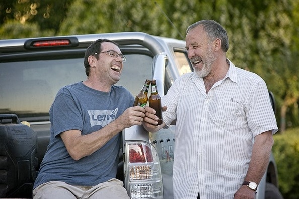 Simon Barbout and his neighbour Barry share a beer.