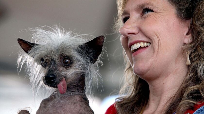 Dawn Goehring holds her dog Miss Ellie