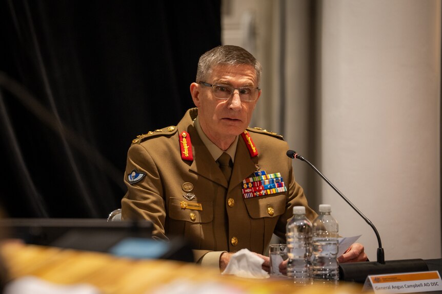 Australian Defence Force chief Angus Campbell at the Royal Commission into Defence and Veteran Suicide black behind him