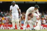Ricky Ponting consoles bowler Peter Siddle after a dropped caught-and-bowled chance.