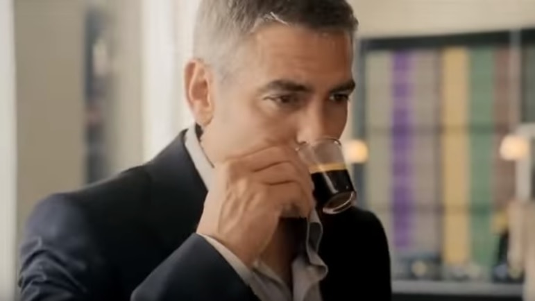 George Clooney drinking coffee