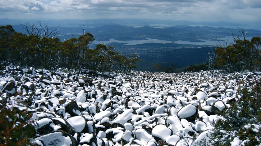 A rock scree on Mount Wellington, dusted with snow. Tasmania