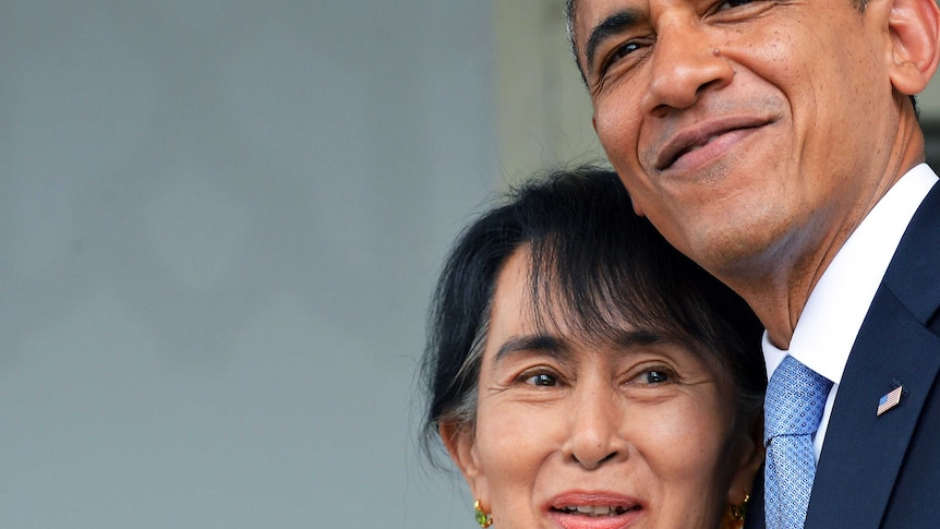US president Barack Obama hugs Burmese opposition leader Aung San Suu Kyi as they leave after making a speech at her residence.