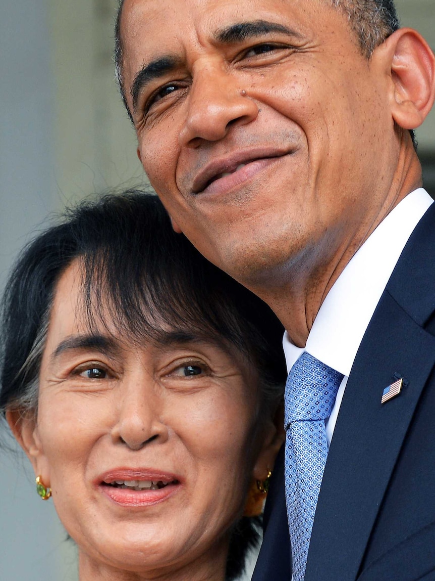 US president Barack Obama hugs Burmese opposition leader Aung San Suu Kyi as they leave after making a speech at her residence.