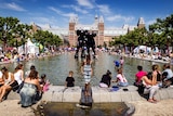 People cool off at a fountain in Amsterdam