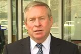 A sombre looking Premier Colin Barnett (head shot) pictured outside the ABC studios