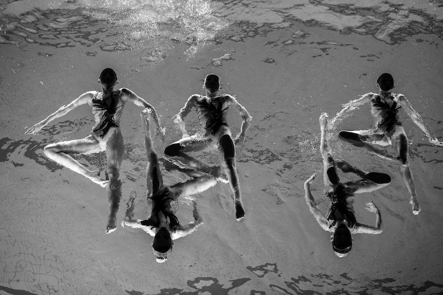 Members of the Neptun Synchro synchronized swimming team perform in Sweden.