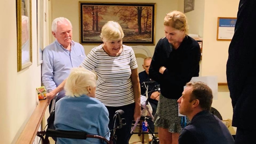 Queensland Health Minister Steven Miles with residents at the retirement village.