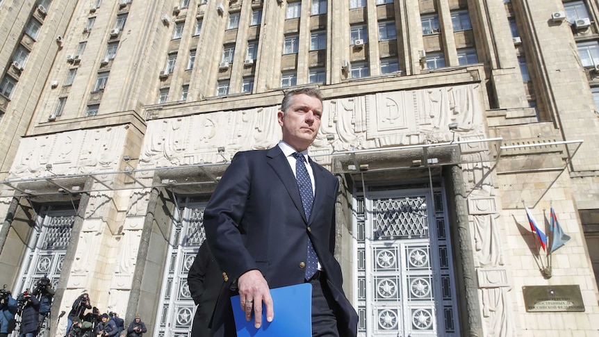 Australian ambassador to Russia Peter Tesch leaves the Russian foreign ministry building in Moscow.